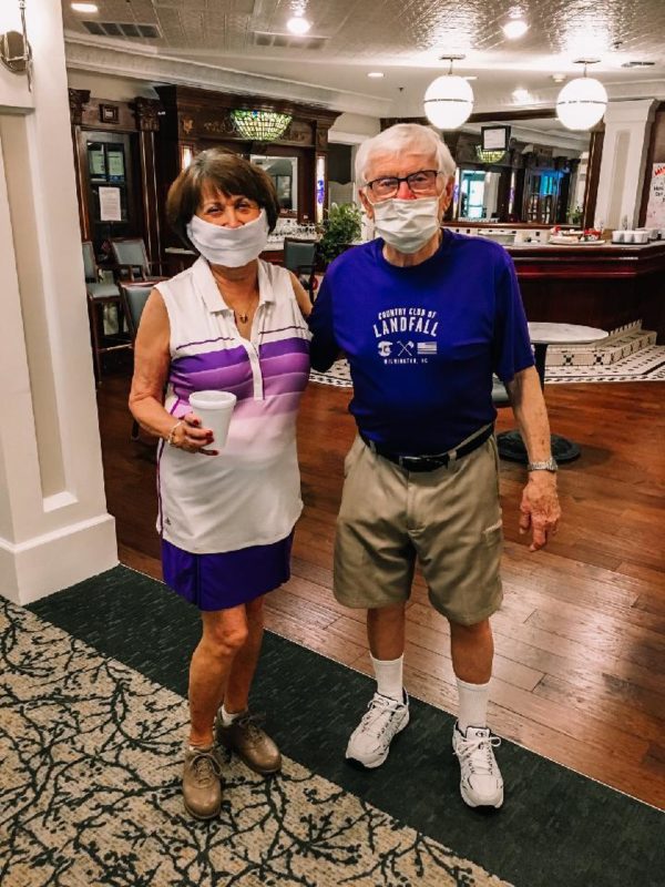 Senior couple in purple
